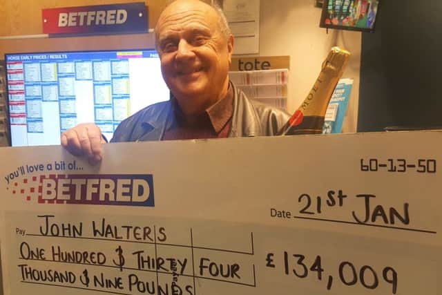 John Walters of Corby celebrating his windfall