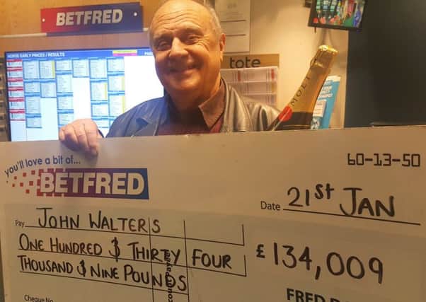 John Walters of Corby celebrating his windfall