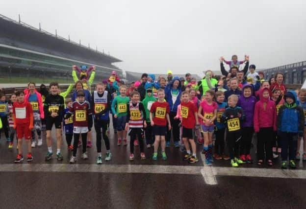 The Brass Monkeys run at Rockingham Speedway for Corby's Lakelands Hospice NNL-160202-100455001