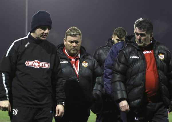 Marcus Law (left), assistant-manager John Ramshaw (right) and the rest of the Kettering Town management team are still hopeful of challenging for a play-off place