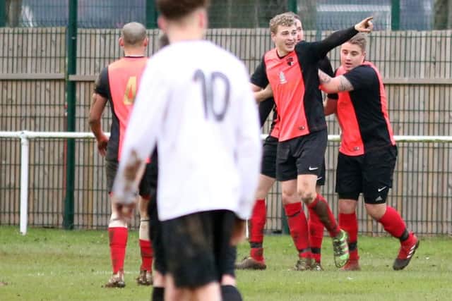 Whitworth celebrate Matt Judge's goal in the 2-2 draw with Bugbrooke