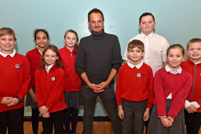 Mr Yeo with pupils from Rockingham Primary School