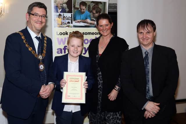 Carers Awards: Kettering: Jane Roebuck Northamptonshire Carers Awards 2016 at Barton Hall.
Young Carer of the Year
Mayor of Kettering Scott Edwards, Marianne Chapman (Barclaycard vice president for customer services), Mark Major (Director of Northamptonshire Carers),
Highly commended Jim Buckland, 13, from Northampton
Wednesday January 25, 2016 NNL-170125-192201009