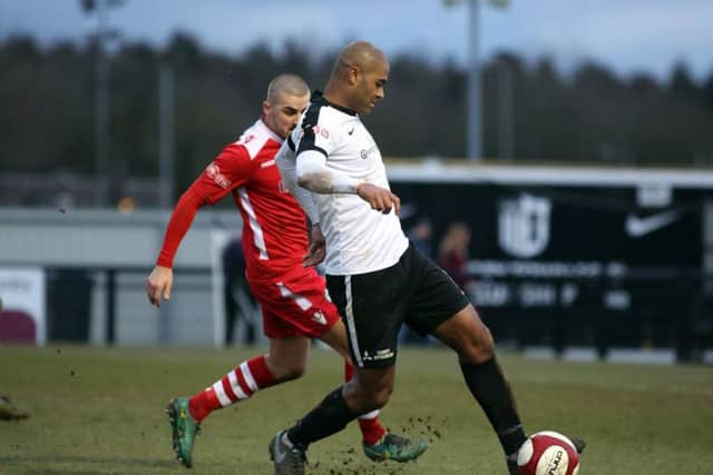 Phil Trainer gets on the ball for the Steelmen against Hednesford