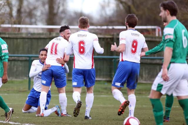 Joe Curtis celebrates his first goal in Diamonds' win at the Dog & Duck