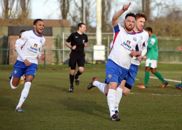 Joe Curtis celebrates one of his two goals in AFC Rushden & Diamonds' 4-0 victory over Loughborough Dynamo. Pictures by Alison Bagley