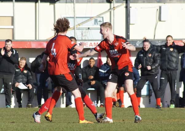 Liam Canavan celebrates scoring a sensational 35-yard volley in Kettering Town's 3-1 victory over Biggleswade Town. Picture by Peter Short