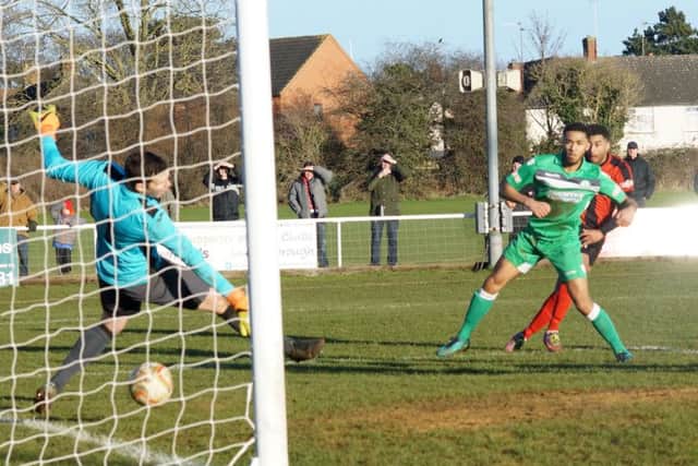 Rene Howe fires home the Poppies' second goal