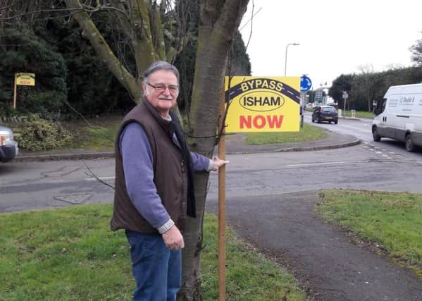 Campaigner Graham Rait with one of the signs.