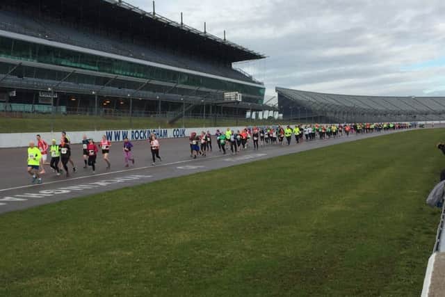 Runners take on the famous oval circuit.