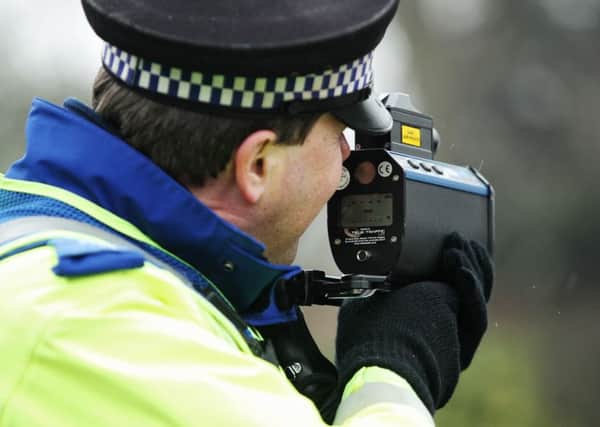 A PCSO using a speed gun in Northamptonshire ENGNNL00120120131153132
