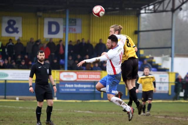 AFC Rushden & Diamonds midfielder Joe Curtis was sent off for this challenge during the 0-0 draw with Belper Town. Picture by Alison Bagley
