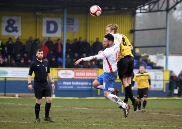 AFC Rushden & Diamonds midfielder Joe Curtis was sent off for this challenge during the 0-0 draw with Belper Town. Picture by Alison Bagley