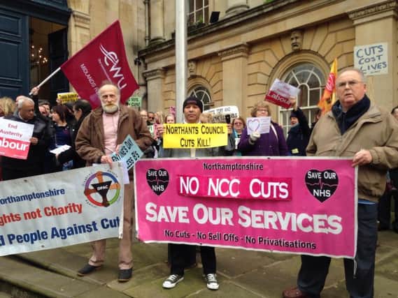 The scenes outside County hall this afternoon, where more than 70 people turned out to protest against stinging county council cuts.