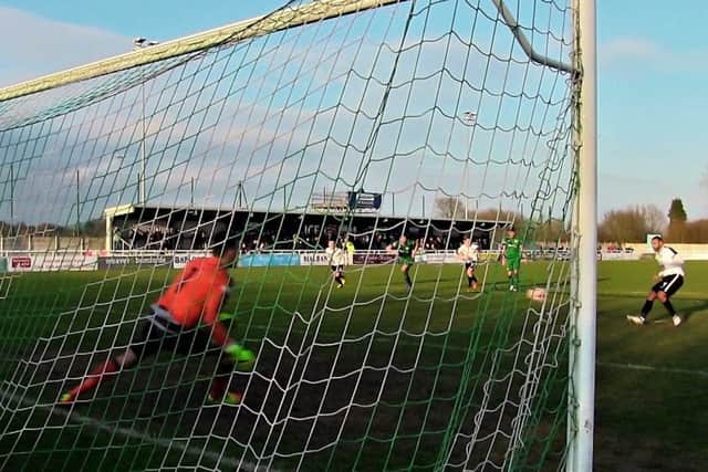 Stefan Moore sends Daniel Gyollai the wrong way from the penalty spot to earn Corby Town a 1-1 draw at Nantwich Town on Saturday. Picture by David Tilley