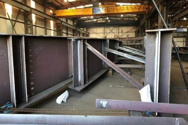 The bridge beams in construction