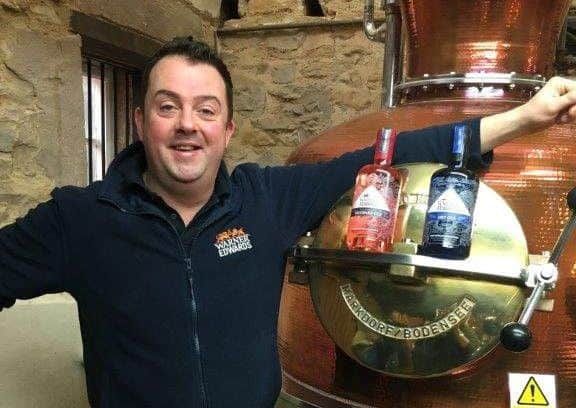 Tom Warner with some of the gins they produce