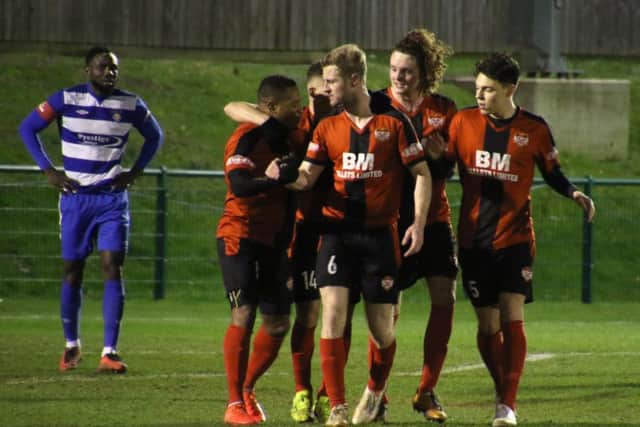 Aaron O'Connor takes the congratulations after scoring one of his two goals in Kettering Town's 3-2 victory at Dunstable Town. Picture by Peter Short