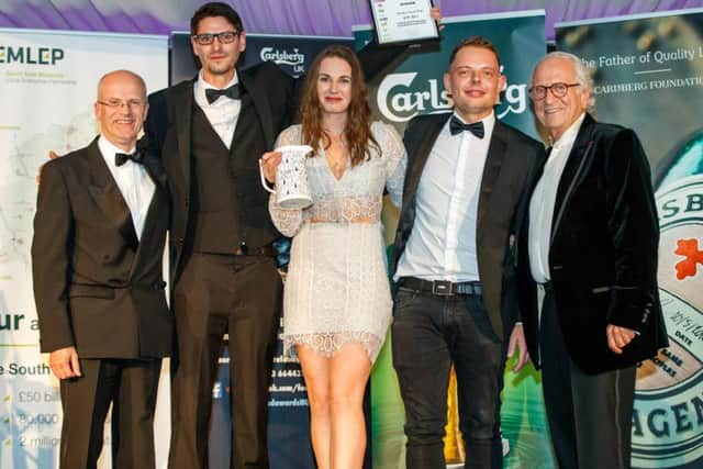 The Plough receiving their award