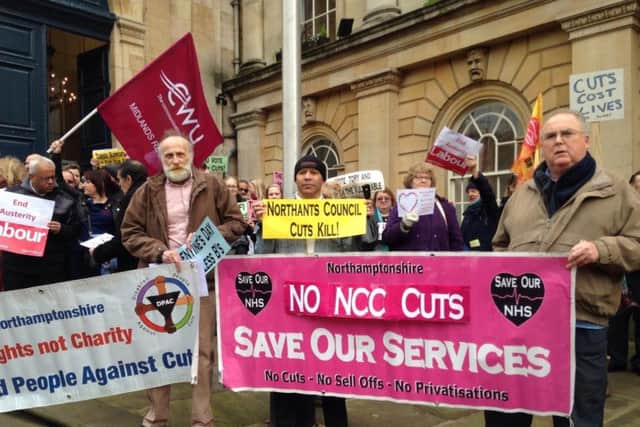 The 58 million worth of cuts has been approved despite two protests at County Hall.