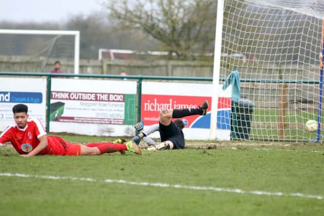 Barry Deacon's shot finds the net for Wellingborough Town as they beat Oadby Town 3-0 last Saturday