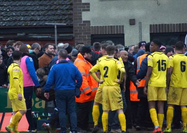 Kettering Town's 2-1 home loss to Chesham United ended in controversy following an altercatio between Poppies fans and Chesham players soon after the final whistle. Pictures by Peter Short