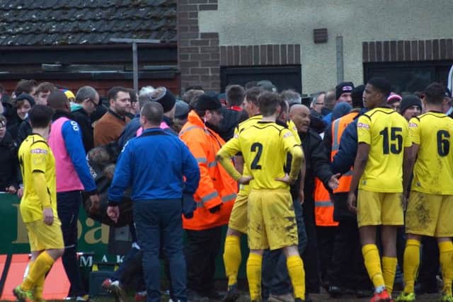 Kettering Town's 2-1 home loss to Chesham United ended in controversy following an altercatio between Poppies fans and Chesham players soon after the final whistle. Pictures by Peter Short