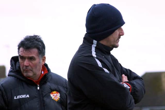 Poppies assistant-manager John Ramshaw (left) and boss Marcus Law pictured during the loss to Chesham