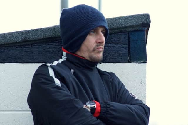 Poppies boss Marcus Law watched on during Kettering Town's home loss to Chesham United. Pictures by Peter Short