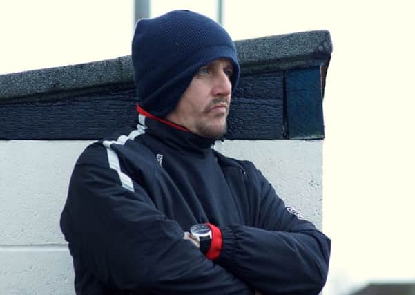 Poppies boss Marcus Law watched on during Kettering Town's home loss to Chesham United. Pictures by Peter Short