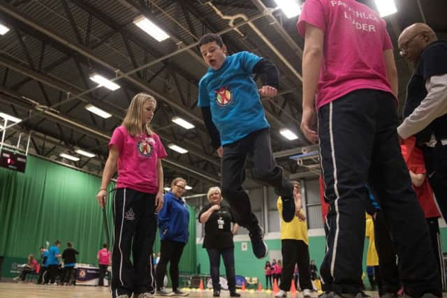 Ronan takes part in the long jump.