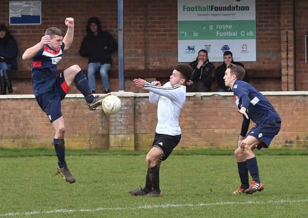 Action from Irchester United's 3-1 defeat at Bugbrooke in UCL Division One last weekend