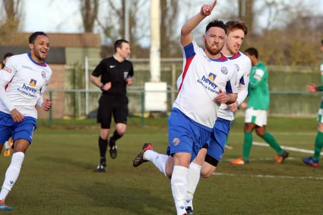 AFC Rushden & Diamonds midfielder Joe Curtis is available again after suspension