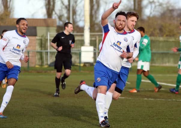 AFC Rushden & Diamonds midfielder Joe Curtis is available again after suspension