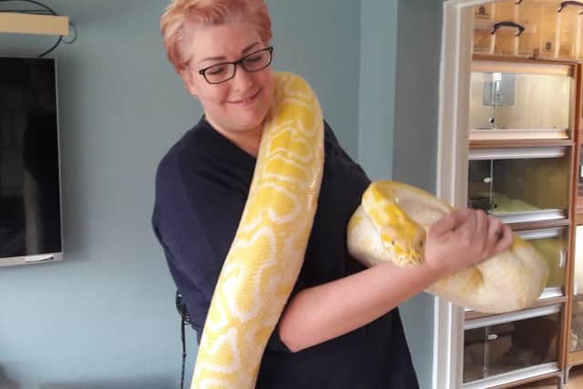 Joanna with Banana the Albino Burmese Python