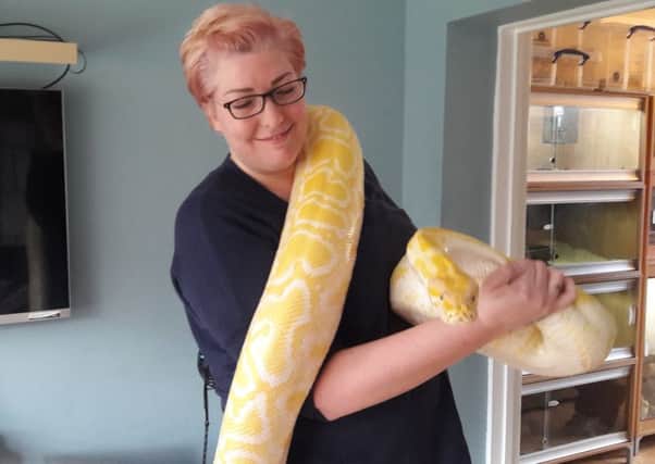 Joanna with Banana the Albino Burmese Python