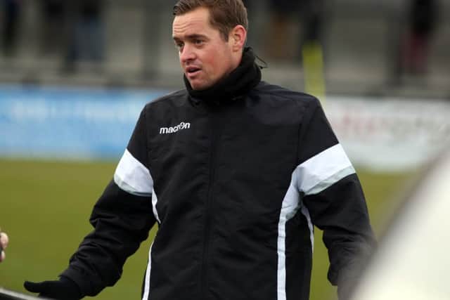 Gary Mills wants his Corby Town players to stay calm in their battle to avoid relegation