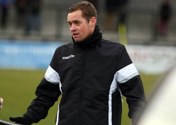 Gary Mills wants his Corby Town players to stay calm in their battle to avoid relegation