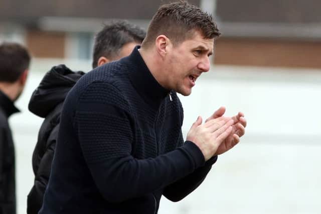 Marcus Law encourages his Kettering Town team during their 1-1 draw with St Ives Town. Pictures by Alison Bagley
