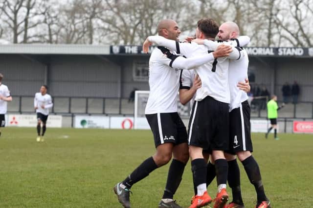 Joe Iaciofano celebrates with his Corby Town team-mates after the Northampton Town loanee scored the Steelmen's second goal in the 5-1 victory over Sutton Coldfield Town. Picture by Alison Bagley