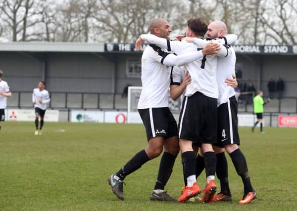 Joe Iaciofano celebrates with his Corby Town team-mates after the Northampton Town loanee scored the Steelmen's second goal in the 5-1 victory over Sutton Coldfield Town. Picture by Alison Bagley