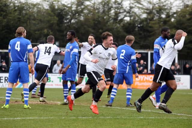 Joe Iaciofano, pictured celebrating his second goal last weekend, says he is enjoying his spell at Corby Town
