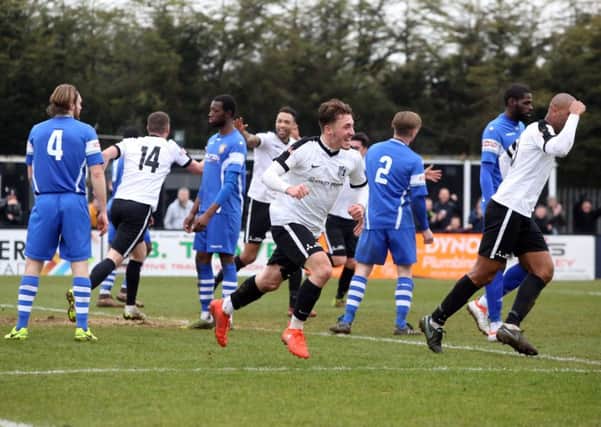 Joe Iaciofano, pictured celebrating his second goal last weekend, says he is enjoying his spell at Corby Town