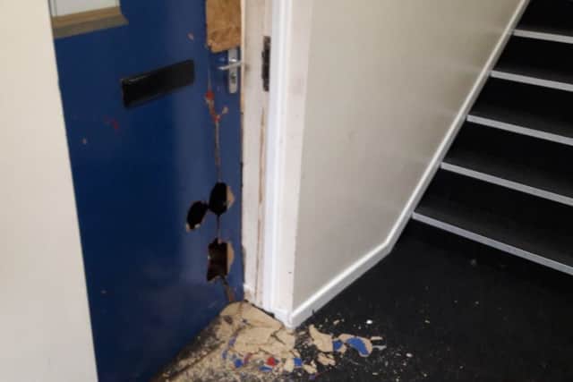 Police had to use the 'big red key' to gain entry.