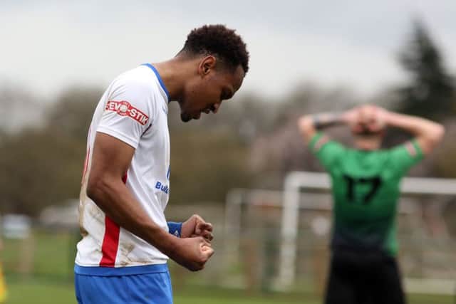 Matchwinner Nabil Shariff celebrates after the final whistle