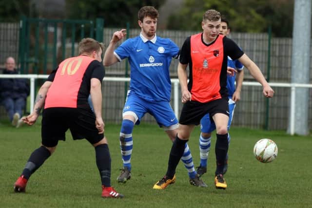 Action from Whitworth's 2-1 victory over Lutterworth Athletic. Pictures by Alison Bagley