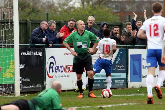 Nabil Shariff celebrates in front of the fans after scoring AFC Rushden & Diamonds' winner against Leek Town. Picture by Alison Bagley