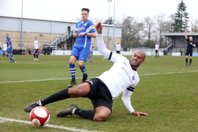 Two goals from Phil Trainer proved to be in vain for Corby Town as they lost 3-2 at fellow strugglers Marine