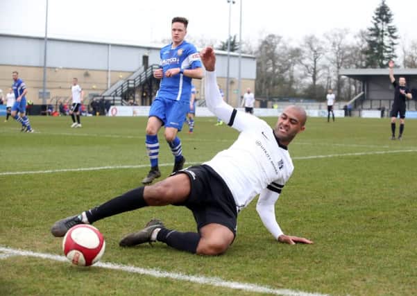 Two goals from Phil Trainer proved to be in vain for Corby Town as they lost 3-2 at fellow strugglers Marine