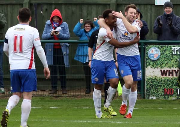 Nabil Shariff is congratulated by Tom Lorraine after he hit the late winner in AFC Rushden & Diamonds' 2-1 success over Leek Town last weekend